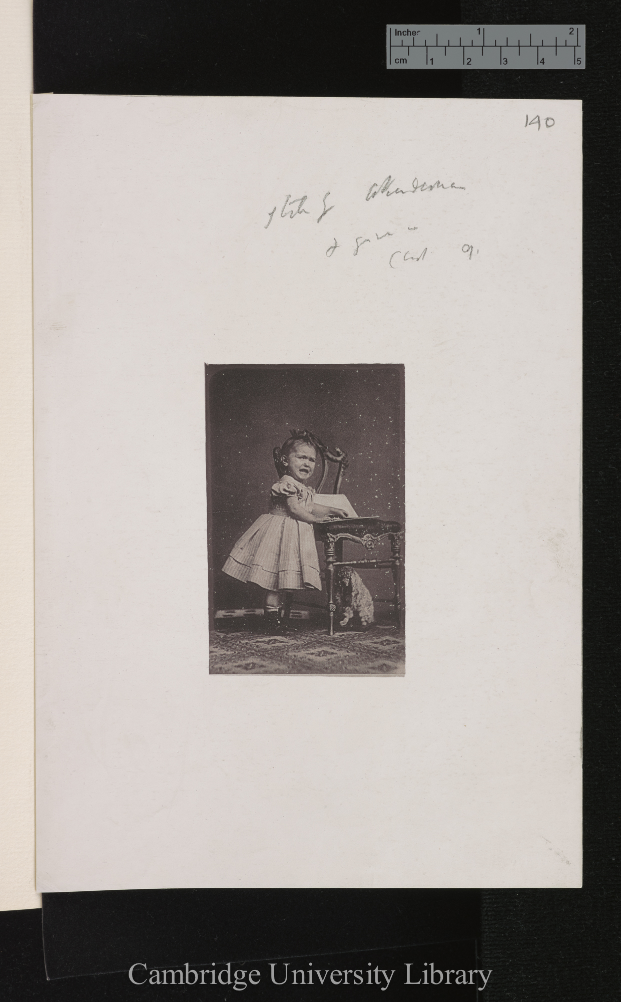 Photo of [unidentified child and dog]