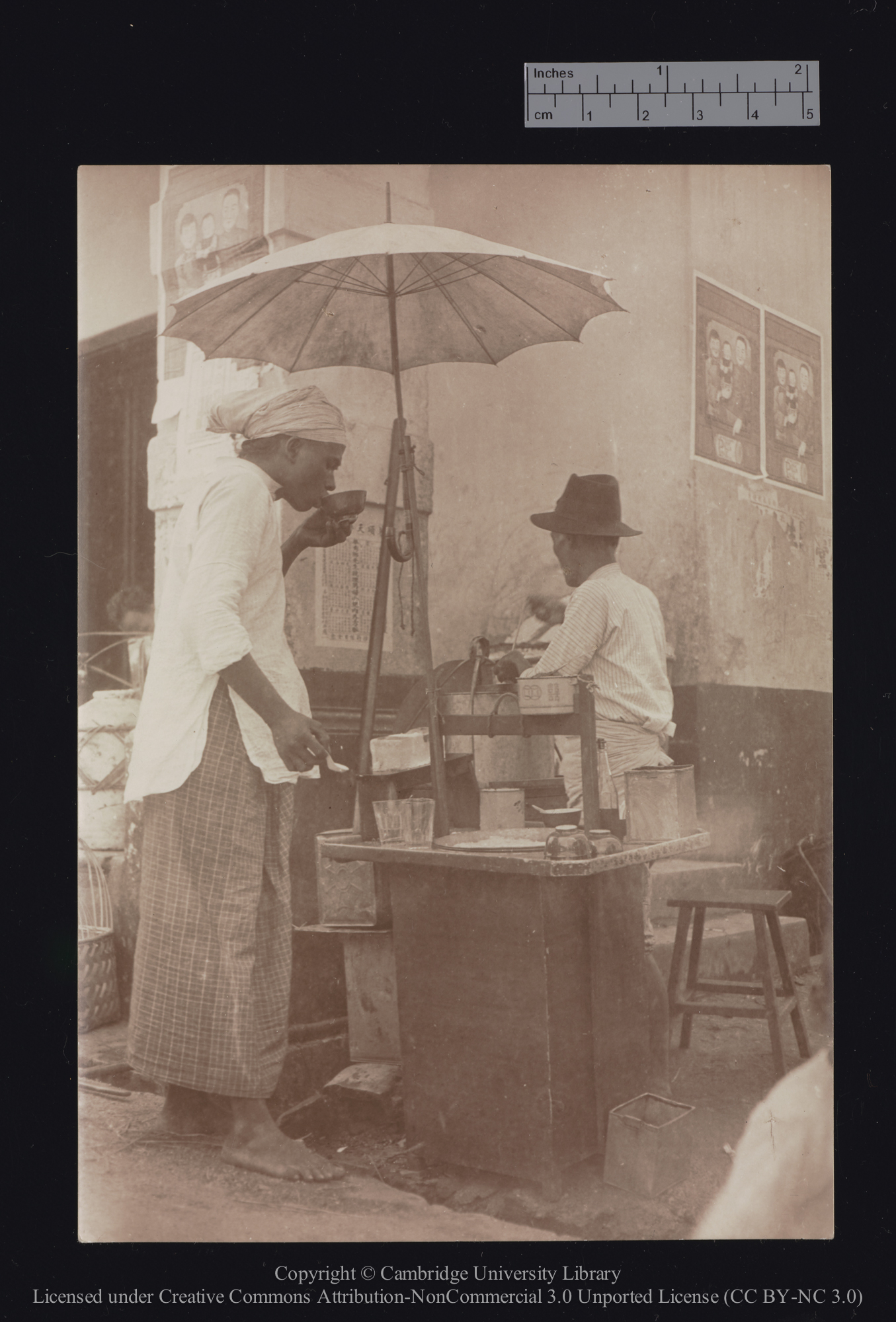 A Tamil enjoying a bowl of tea, 1910 - 1929