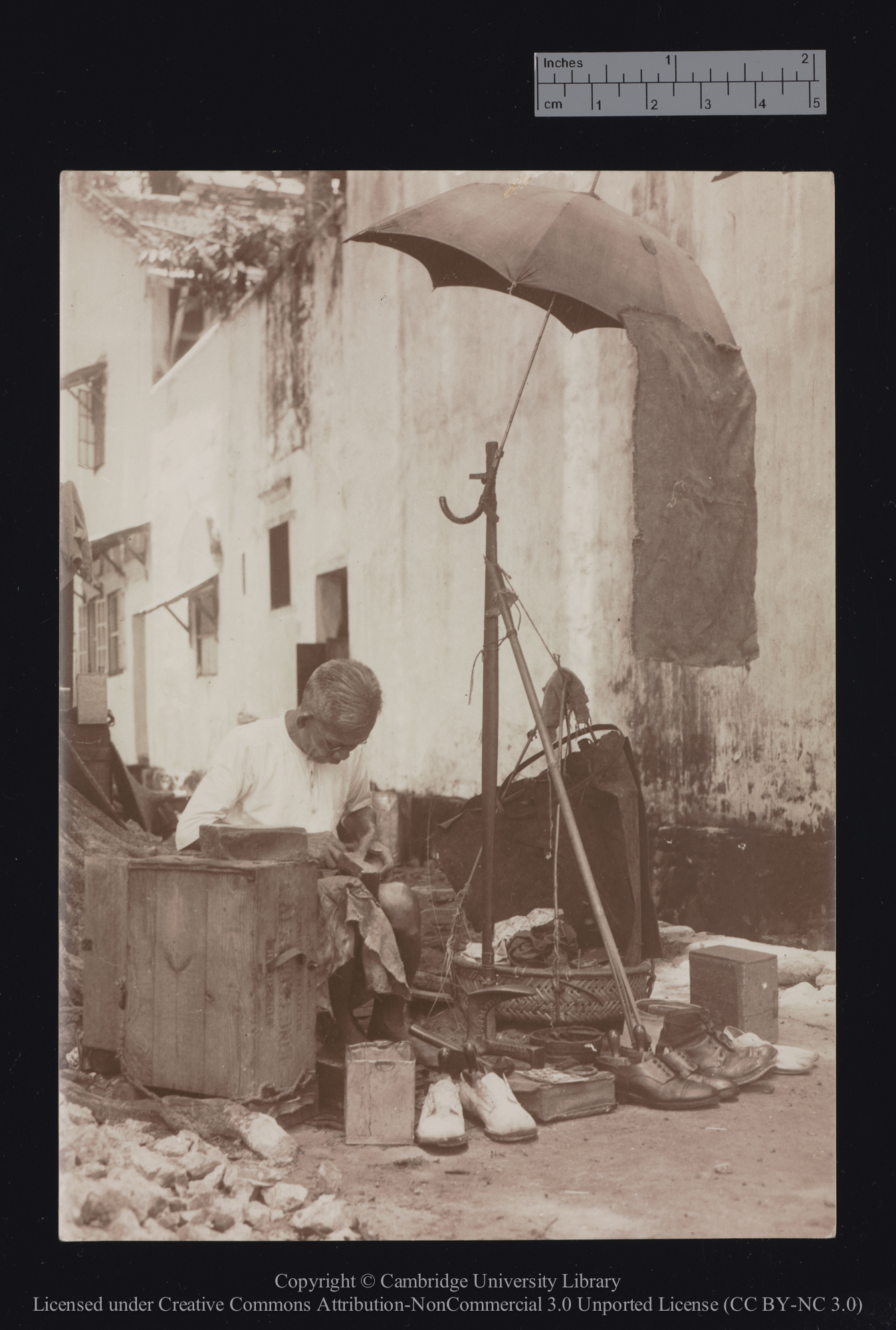 The cobbler, of an ? Ipoh back lane, 1910 - 1929