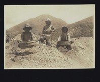 Tomb 502, close up of 3 workmen sifting soil