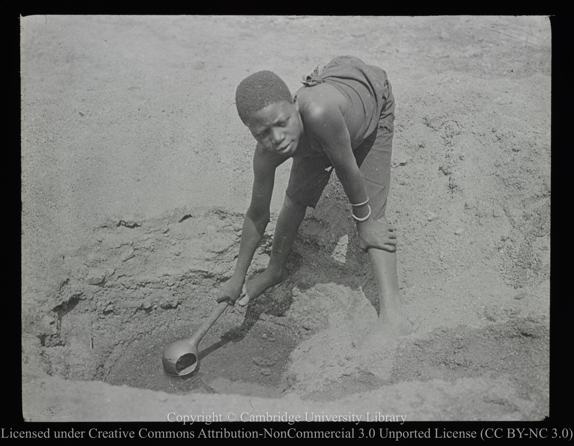 African boy at water-hole, 1900 - 1947
