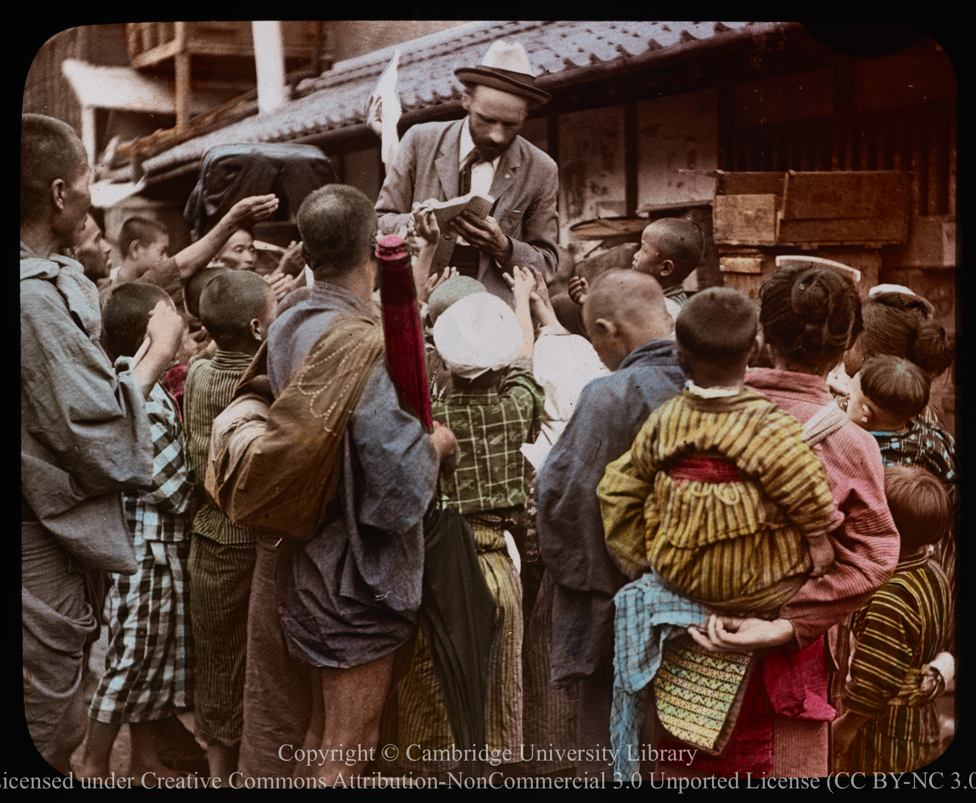 Rev. Heber J.  Hamilton of Canadian CMS distributing tracts at Ichinomiya, 1900 - 1930