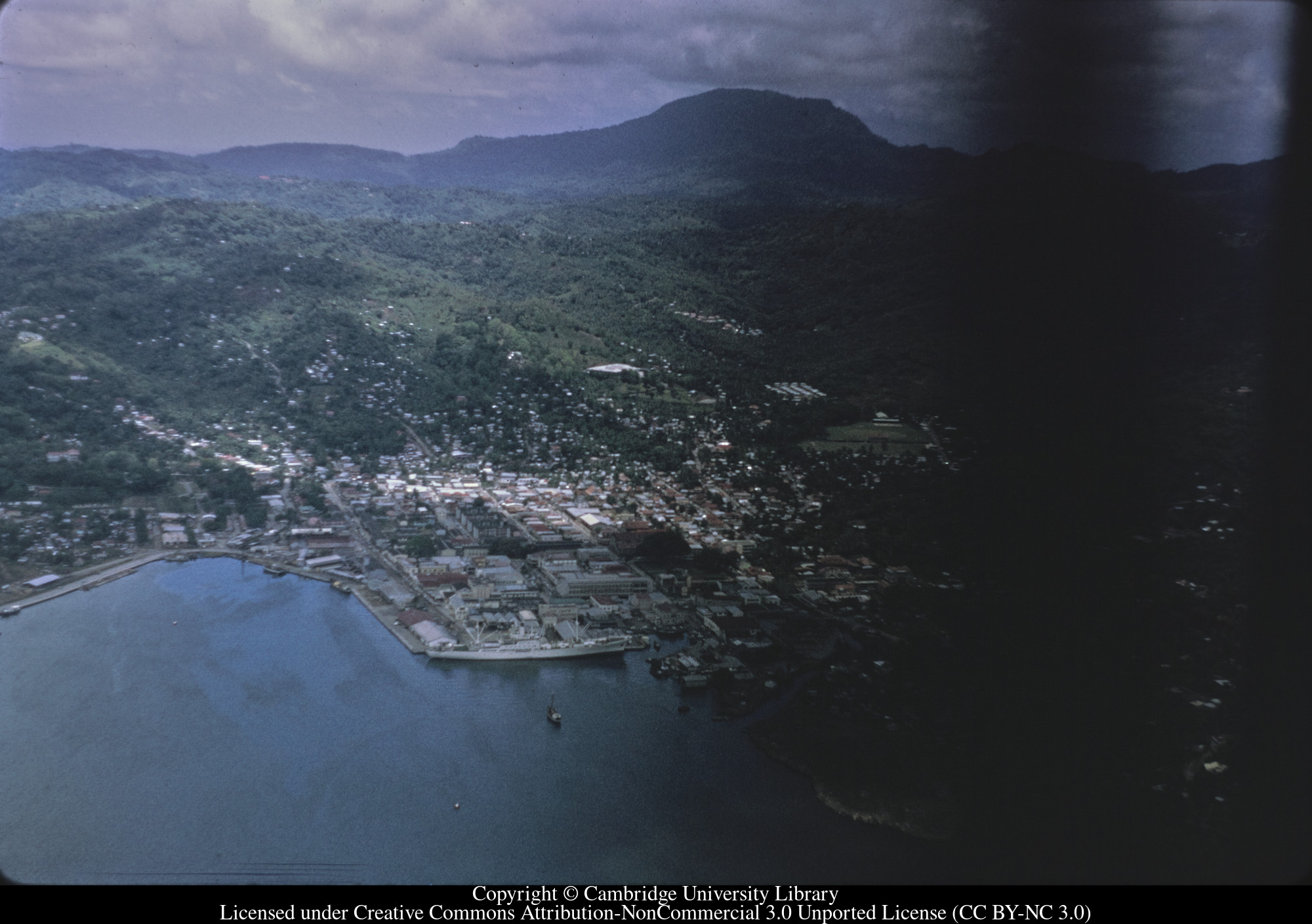 Castries from air before 1971 harbour extensions : Geest banana boat alongside, 1971