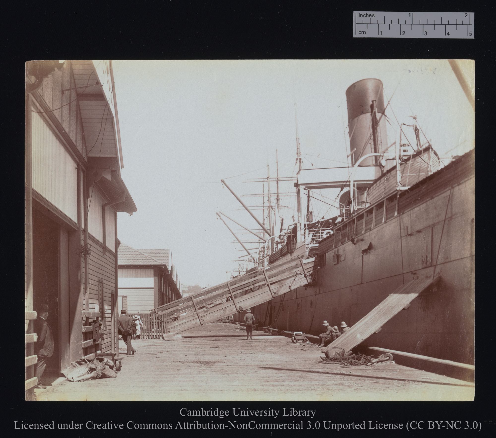 [Gangway from quayside (left) to unidentified ship at right], 1899 - 1901